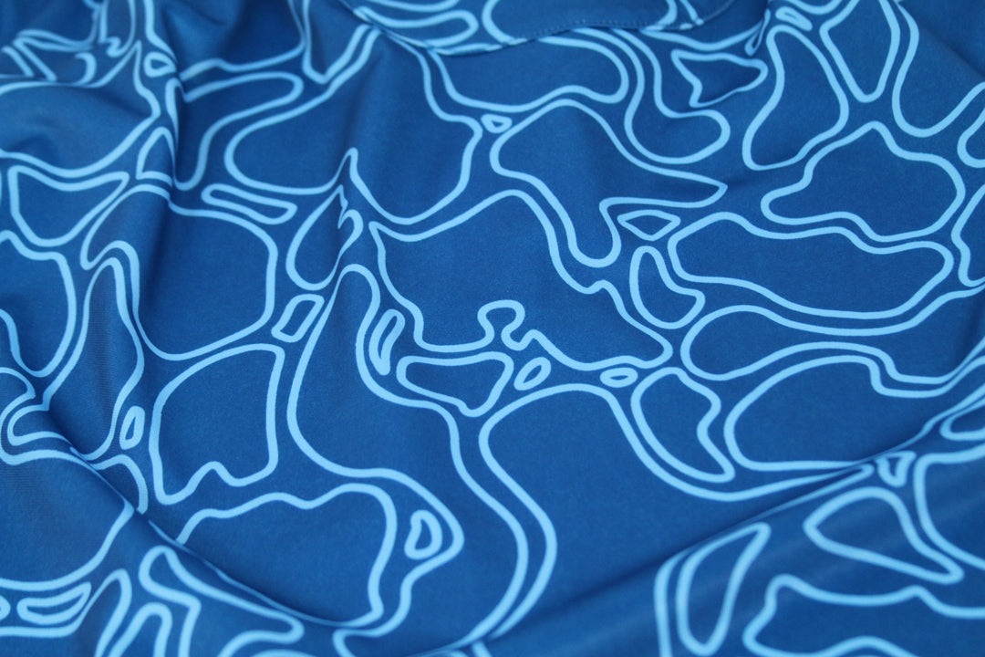 "Island Coral Makai Blues" - OGA Ladies Polo - Blues