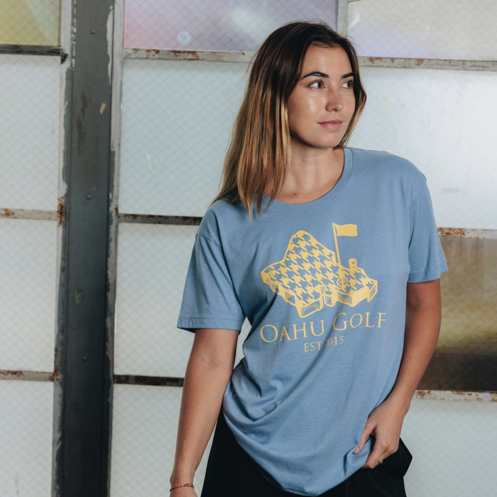 "Island Houndstooth" - OGA Unisex Graphic Tee - Light Blue Heather