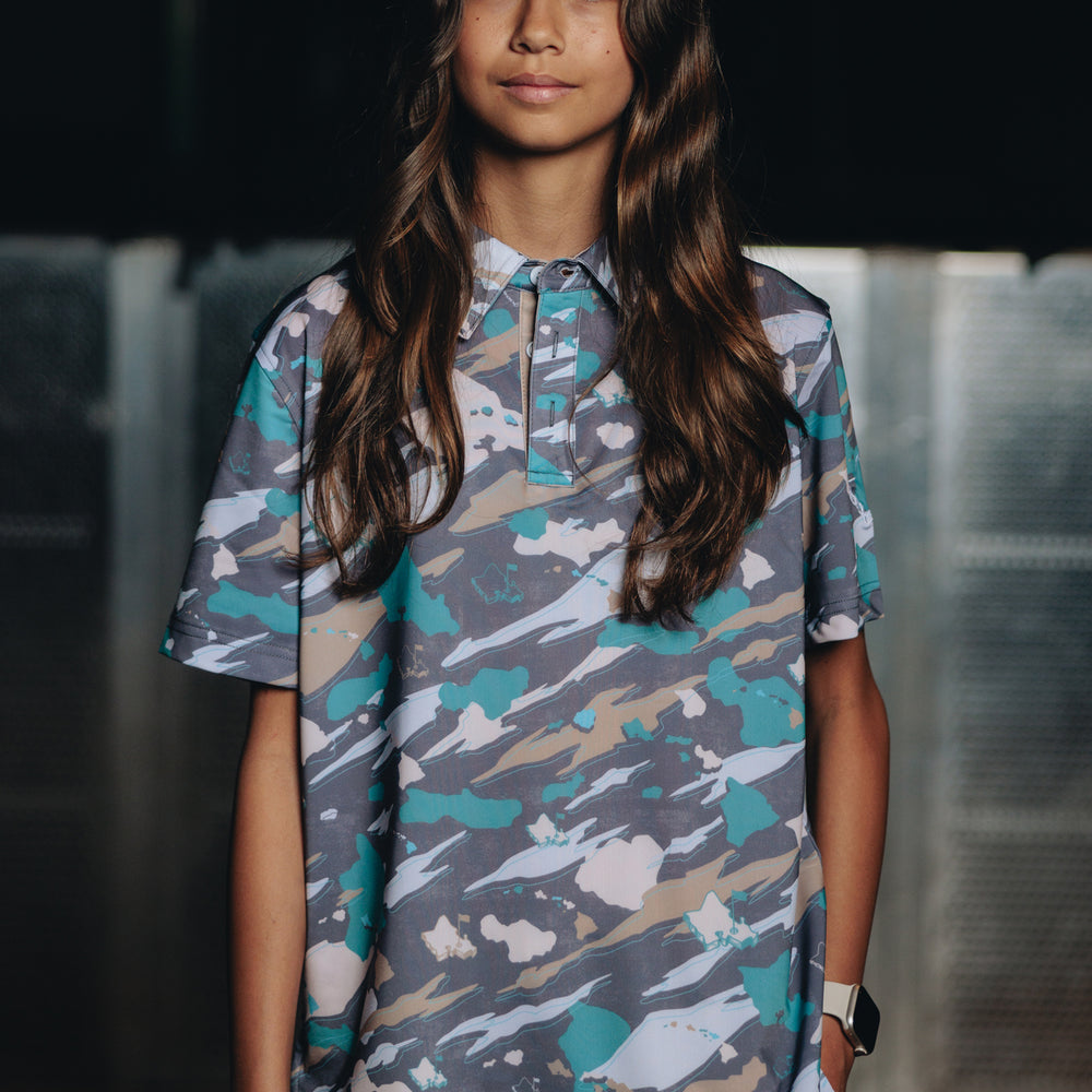 
                      
                        "Island Flow Camo" - OGA Youth Polo - Teal / Sand
                      
                    