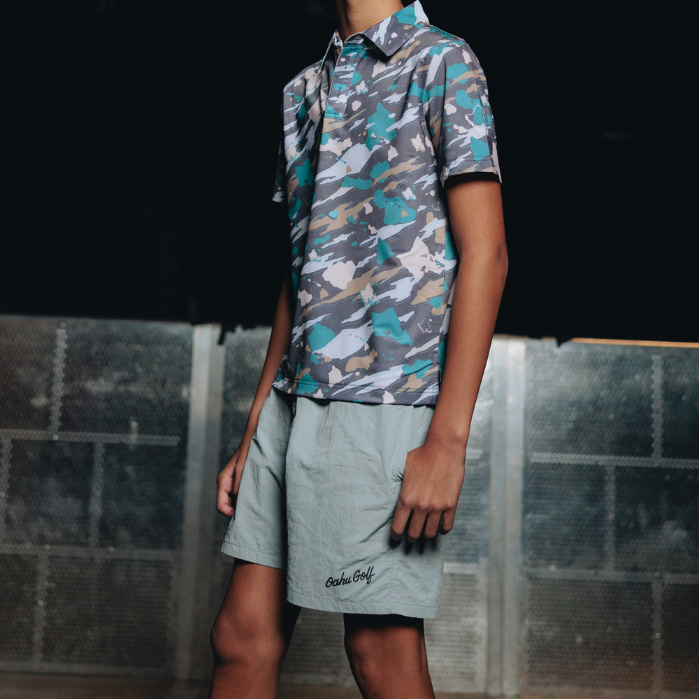 
                      
                        "Island Flow Camo" - OGA Youth Polo - Teal / Sand
                      
                    