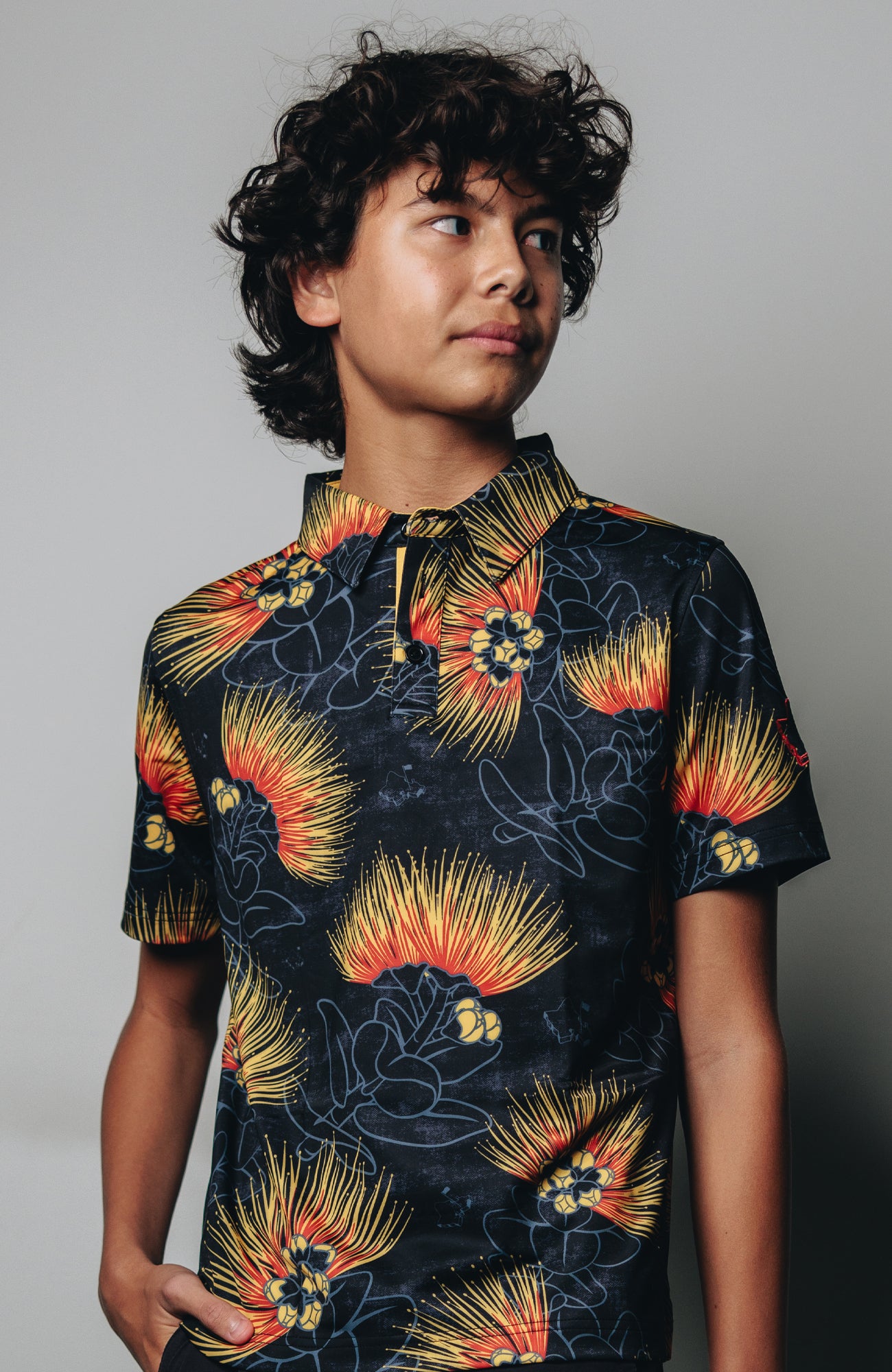 "Ohia Lehua" Amber Red - OGA Youth Polo - Black Amber